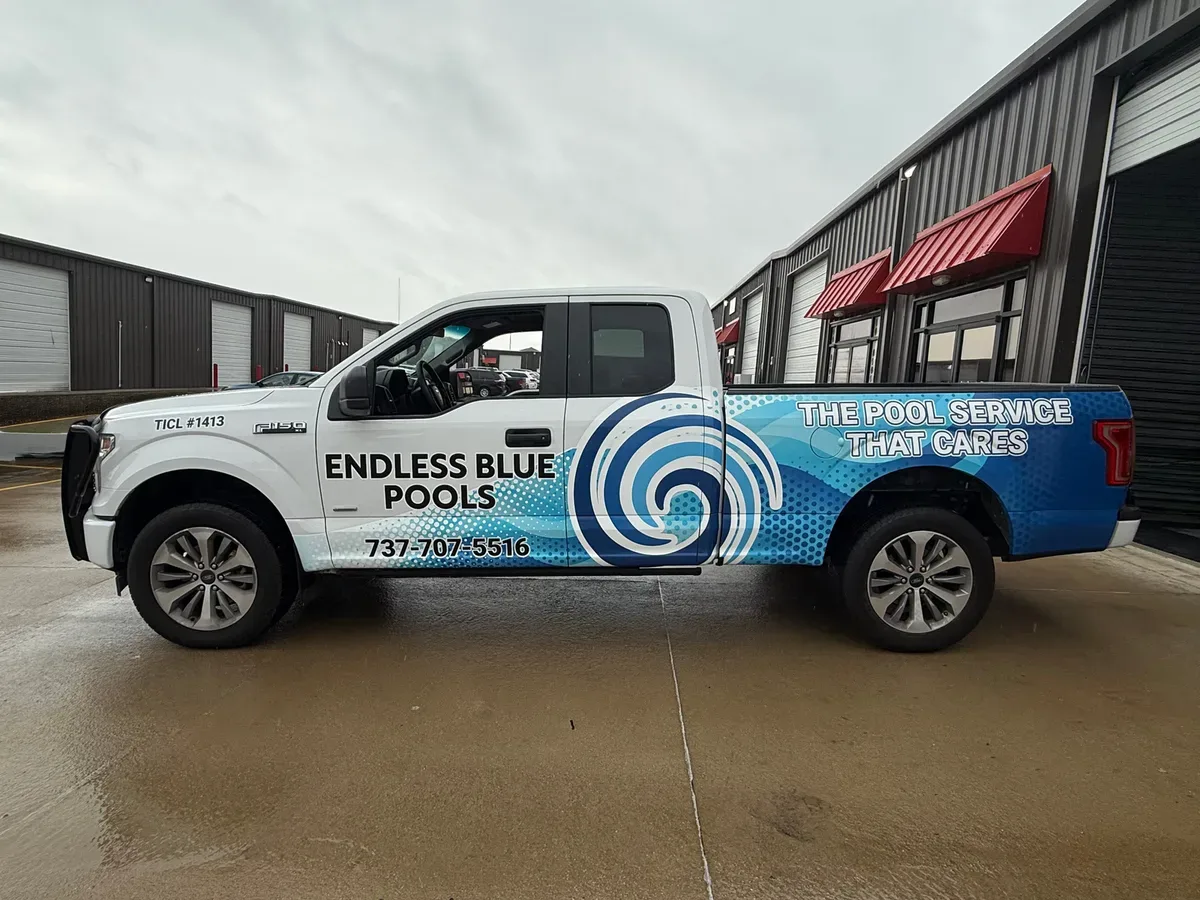 Endless Blue Pools wrapped service truck serving Round Rock and Greater Austin